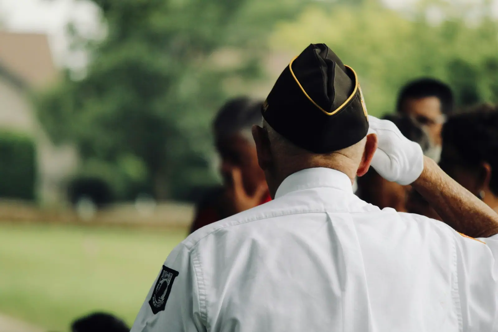 A veteran standing with quiet resolve